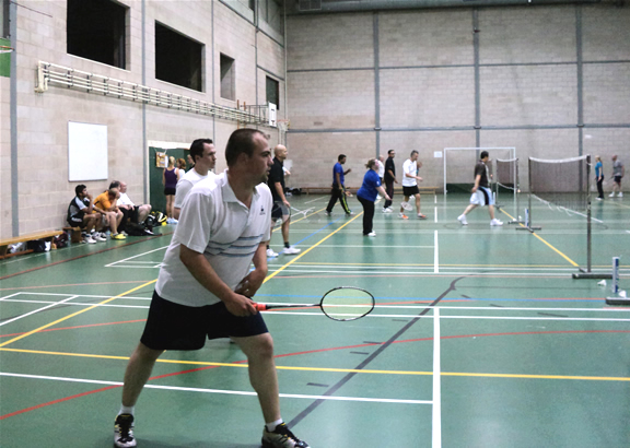 Club night at Epsom College Sports Hall; Bookham Badminton Club, Surrey, UK